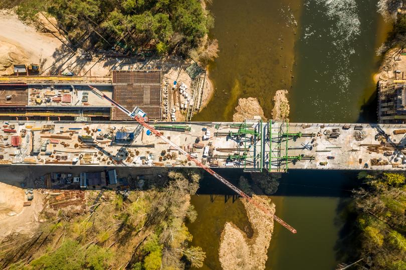 A modern concrete bridge under construction