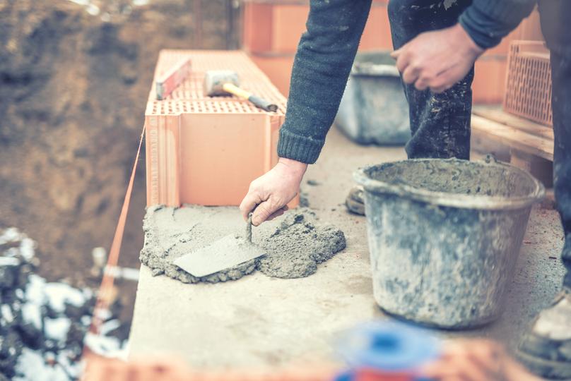 A concrete pump being used on a construction site